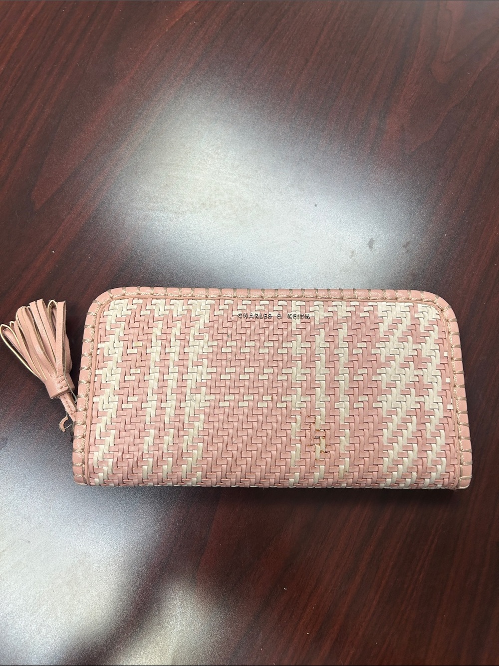 Charles & Keith Woven Pink Zip-Around Wallet with Tassel